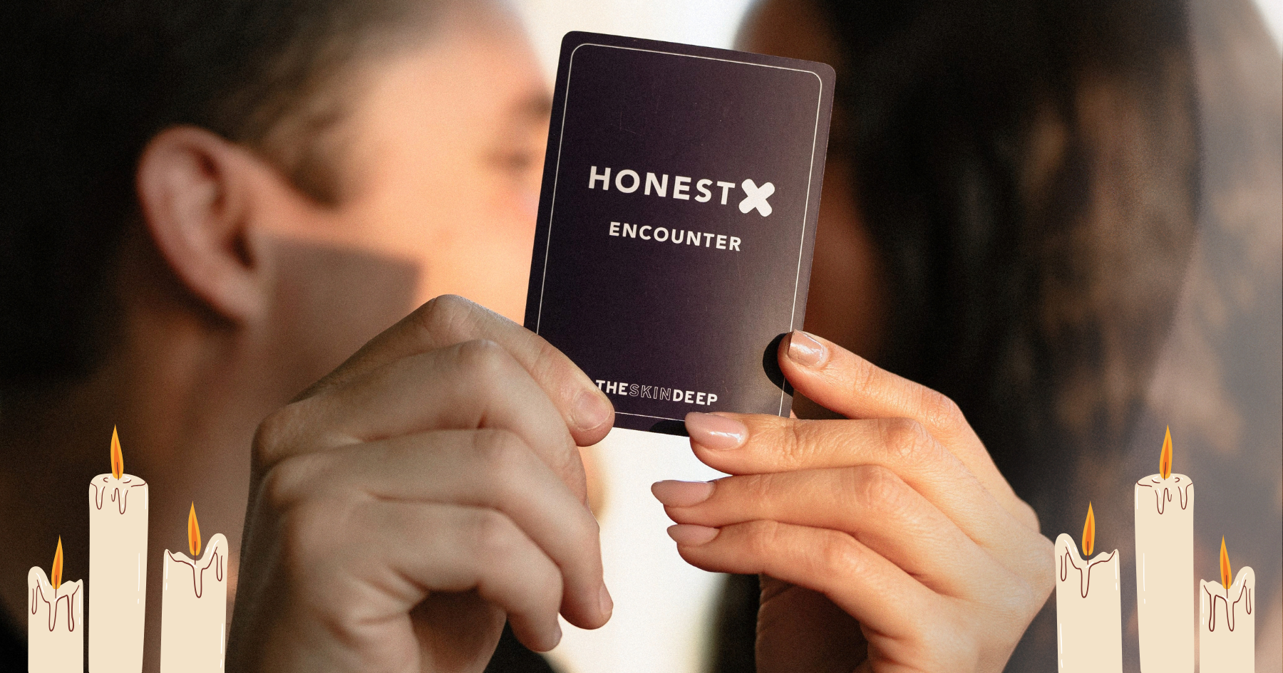 Picture of a couple kissing covered by an Honest X card held by their hands