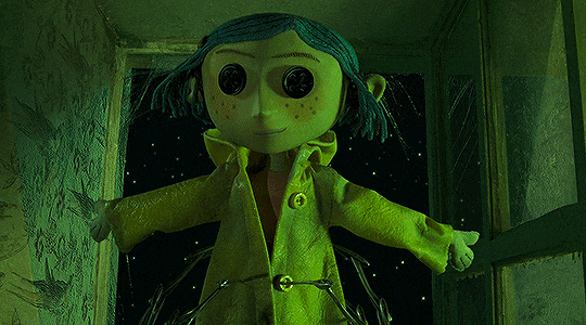GIF from Coraline showing a doll being thrown out a window by a pair of needle hands