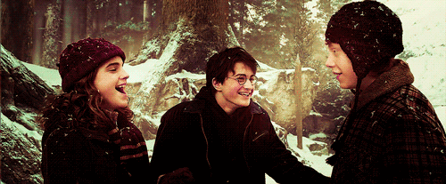 GIF from Harry Potter and The Prisoner of Azkaban showing Harry, Ron and Hermione laughing in the snow