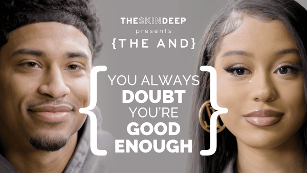 An African American couple face to face being emotional and crying
